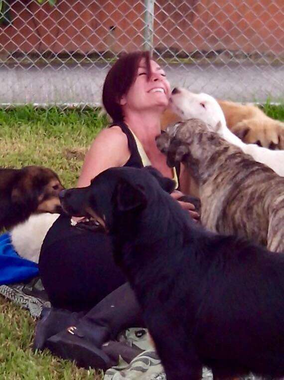 Lya Battle with her rescue dogs at her dog sanctuary in Costa Rica