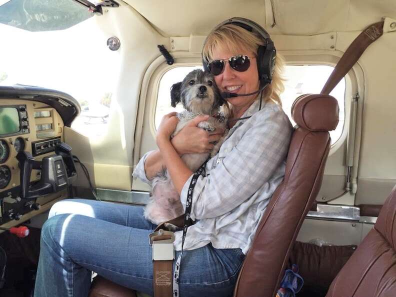 Pops, held by Caryl, Pilots N Paws co-pilot