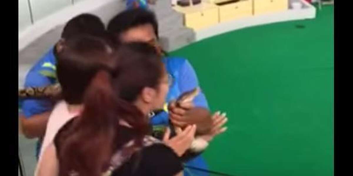 Woman Tries To Kiss Python, And He's NOT Into It - The Dodo
