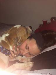 Russ the pit bull hugging his new mom, Kayla