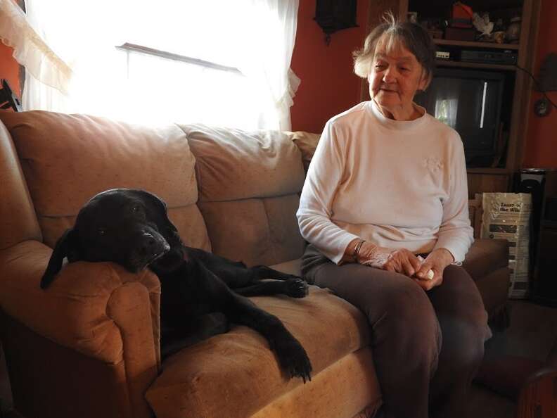 Elderly woman Lillian Bibber with senior dog Shelby