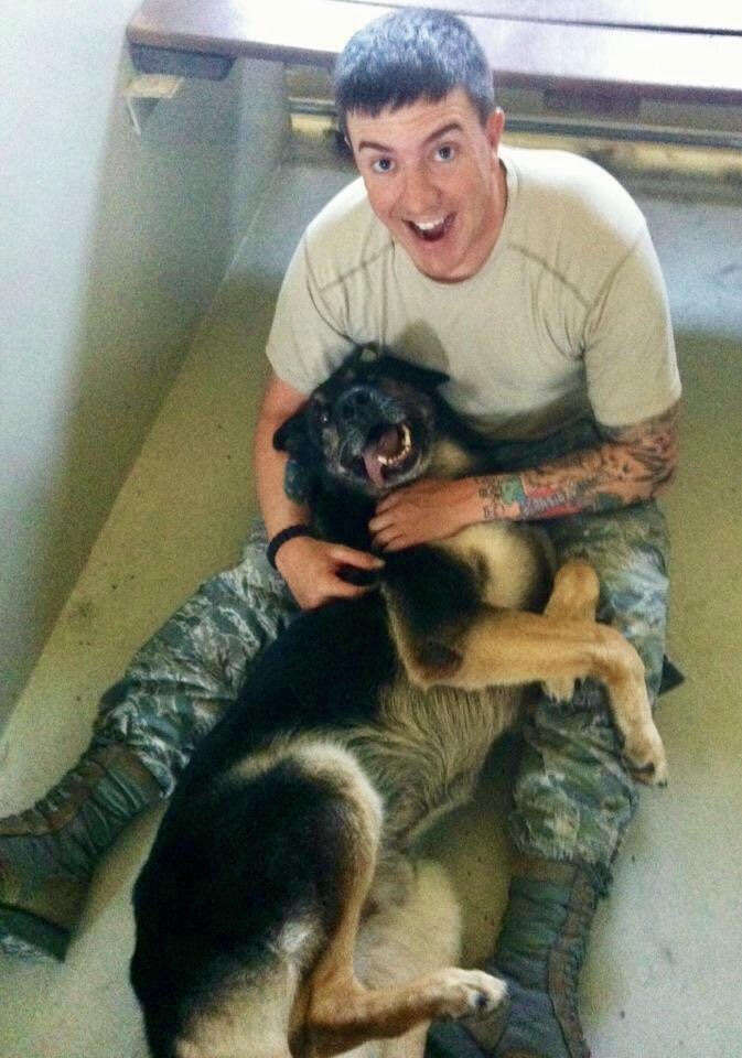 Bodza, a former bomb detector dog for the U.S. air force, and his owner, Kyle Smith.