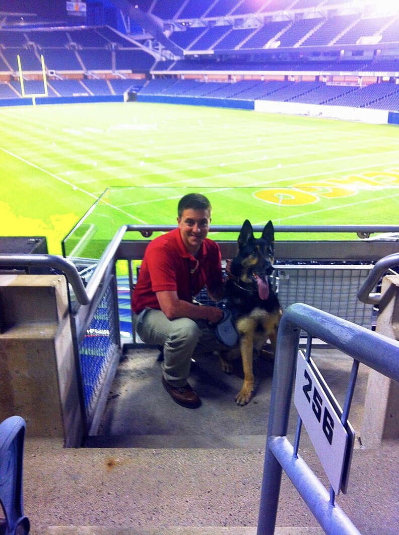 Bodza, a former bomb detector dog for the U.S. air force, and his owner, Kyle Smith.