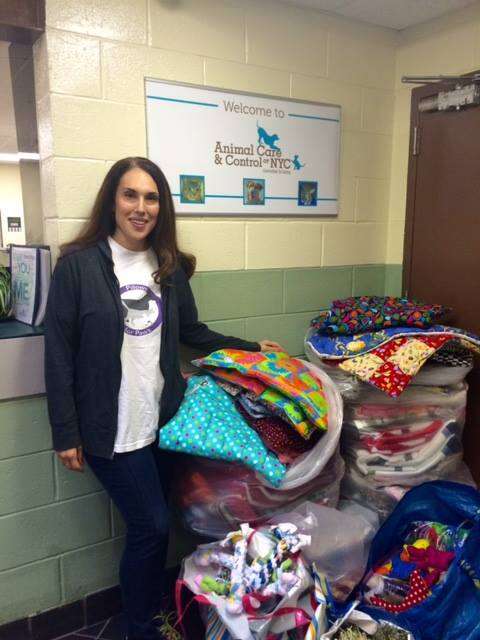 jennifer halpern with shelter donations through pillows for paws