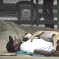 homeless man in brazil with dog