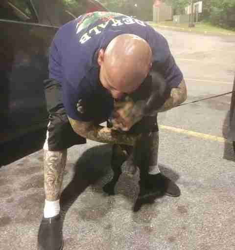 nurse takes care of man's dog