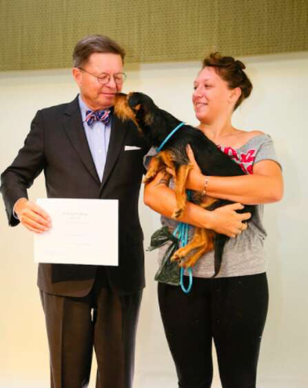 dog graduates from Eckerd College