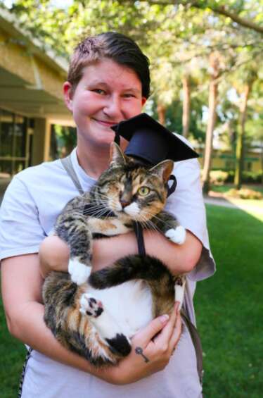 cat graduates from Eckerd College