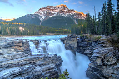 a mountain overlooking a waterfall