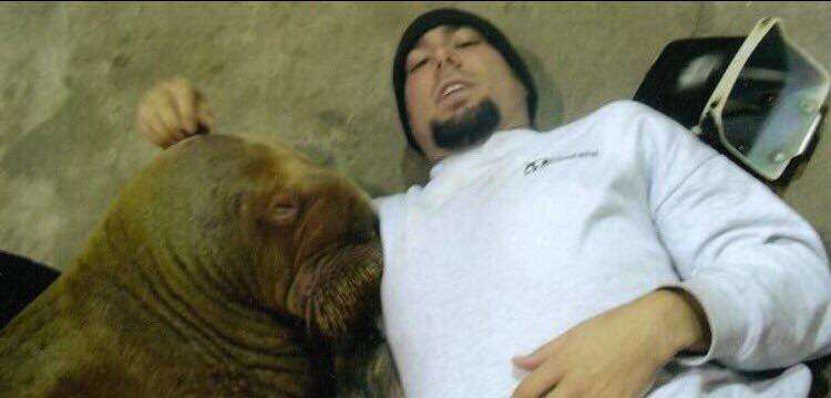 Phil Demers with Smooshi the walrus at Marineland