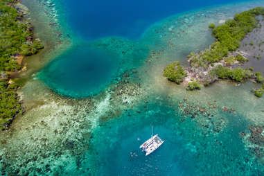 yacht off the coast of several small islands