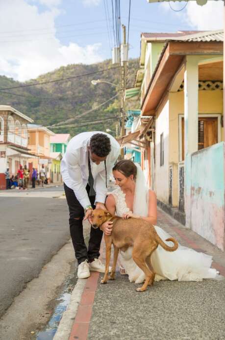 Bride and groom with dog