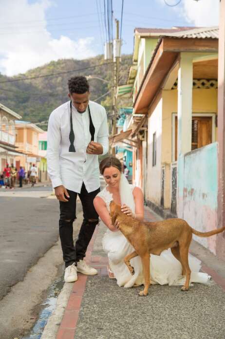 Logan Ryan and Ashley Bragg with dog