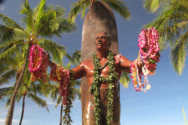 The Statue of Duke Kahanamoku, draped with leis