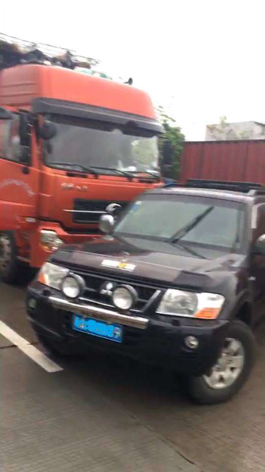 SUV blocking dog meat truck