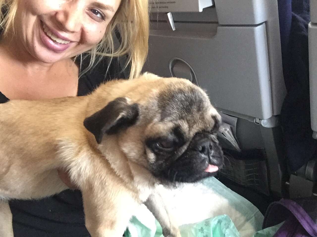 Woman with rescued pug