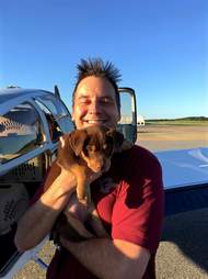 Pilot and rescue dog