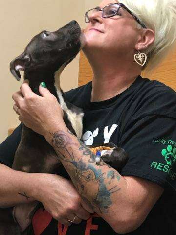 Woman with rescued dog