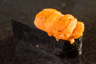 uni sea urchin sashimi sushi orange rice seafood