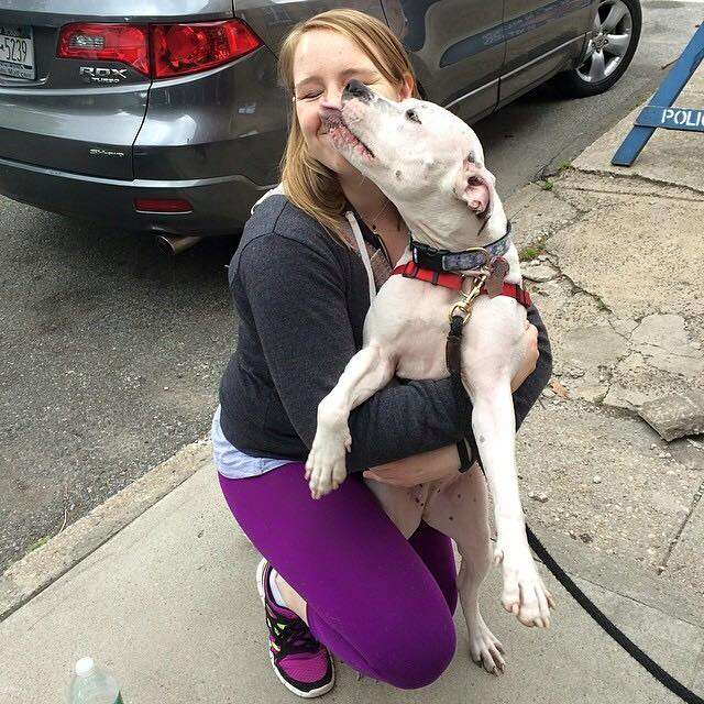 Woman hugging rescue dog