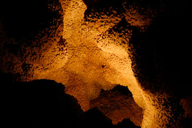 the popcorn-like ceiling of a cave