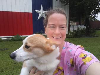 Woman holding rescue dog