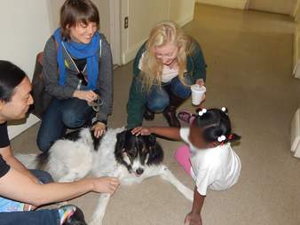 Children with rescue dog