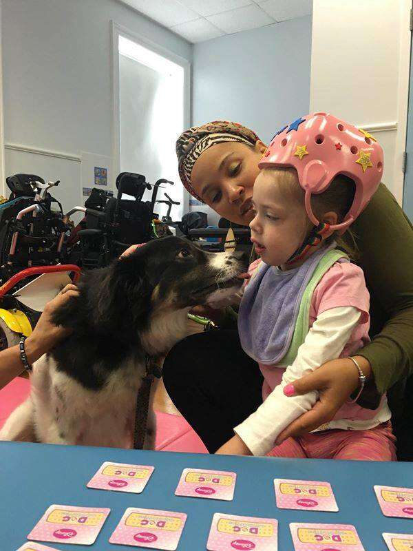 Dog with disabled girl