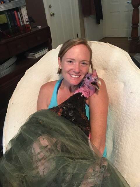 Woman holding rescued turkey