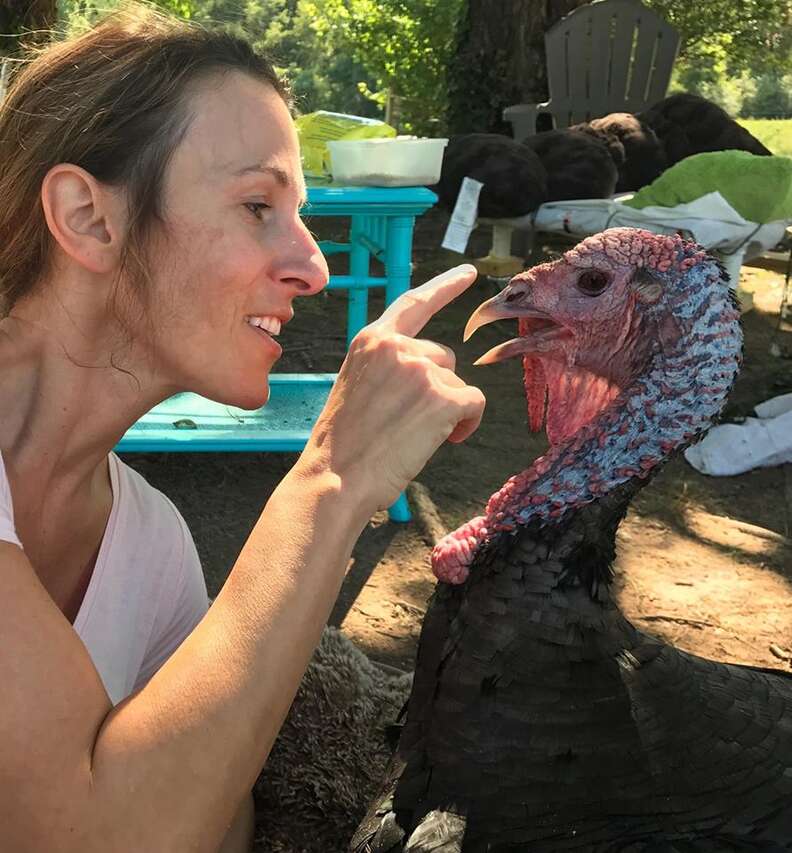 Woman with rescued turkey