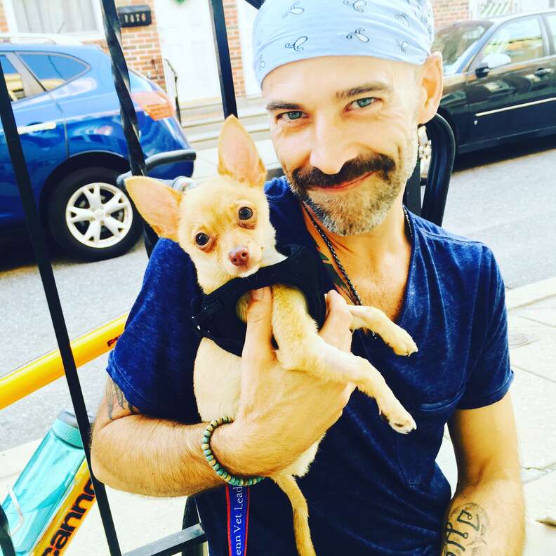 man and puppy heal together