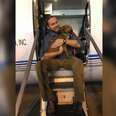 Dog Being Flown To Safety From Hurricane Just Wanted To Be Held By Rescuer