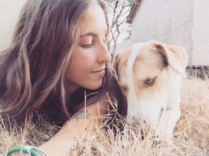 Woman on ground with dog