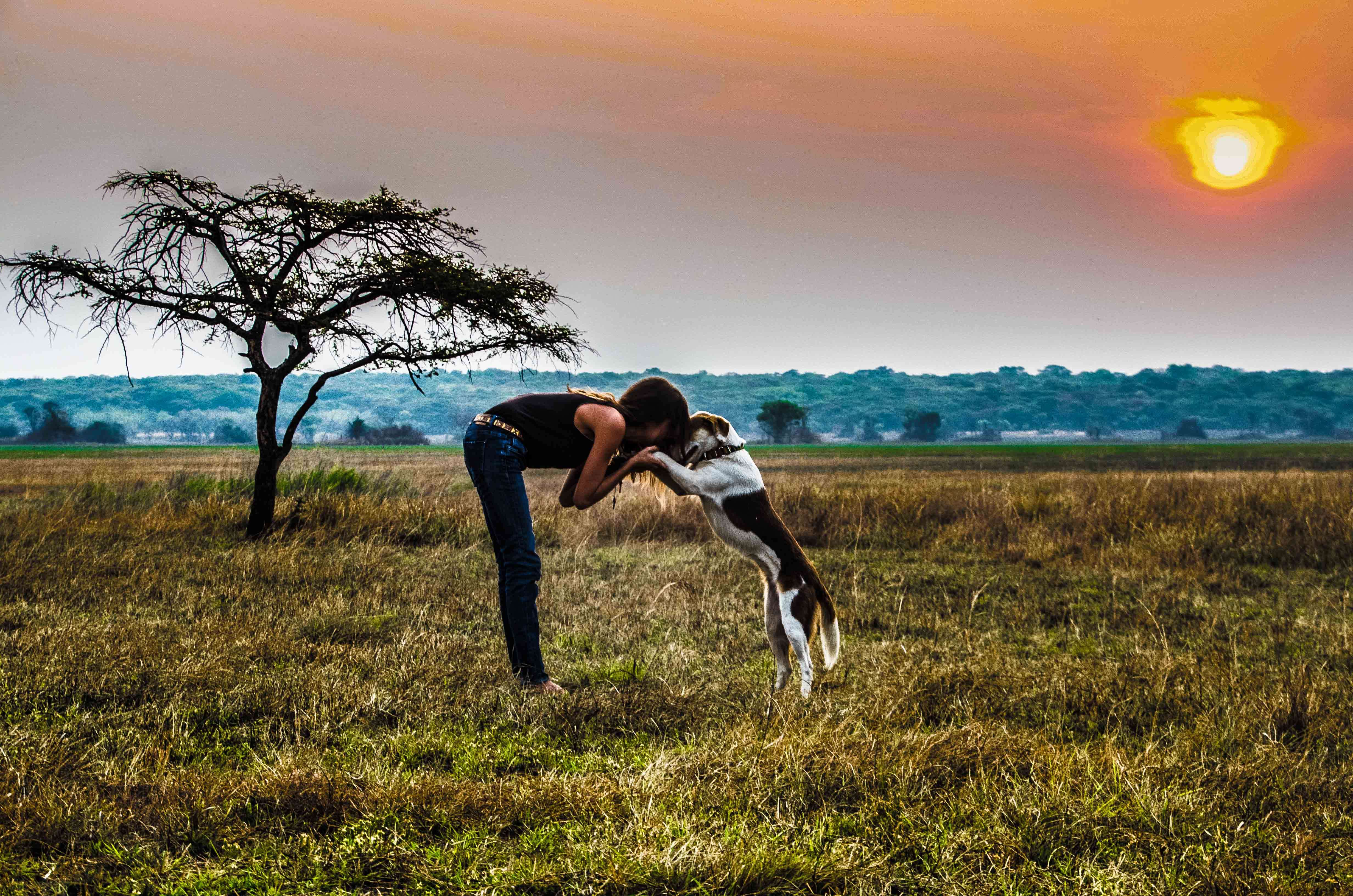 Woman with dog in Africa