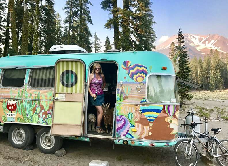 Pet goat and dog go on adventures in vintage Airstream 