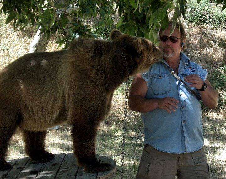 Notorious animal trainer with a captive bear