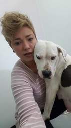Woman hugging dog