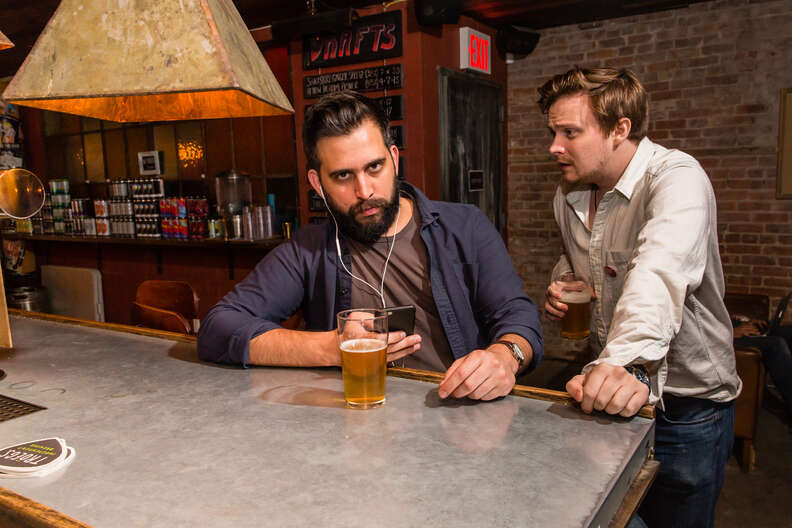 two people in a bar