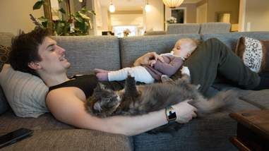 cat loves her new baby sister