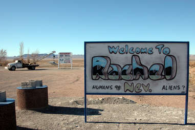 a sign for Rachel, Nevada in the desert