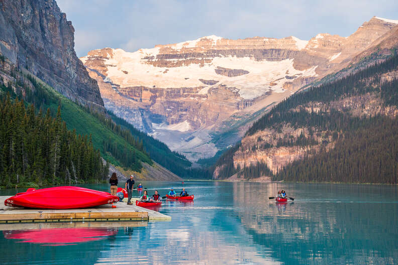 kayakers in a mountainside lake