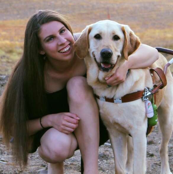 Danielle Sykora and her seeing eye dog Thai