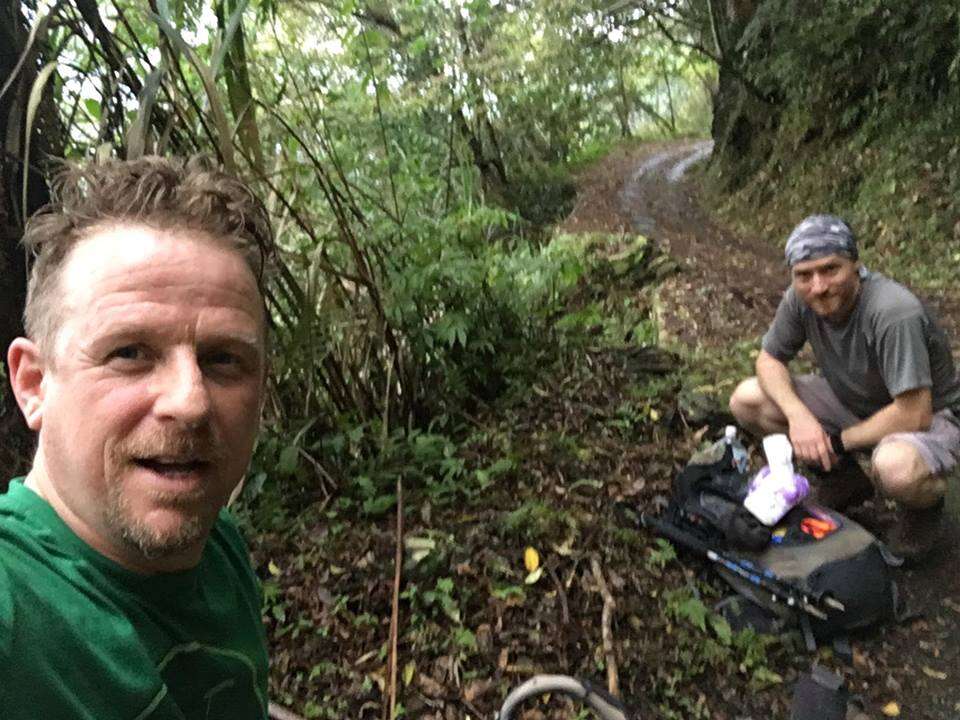 Men at the bottom of the trail