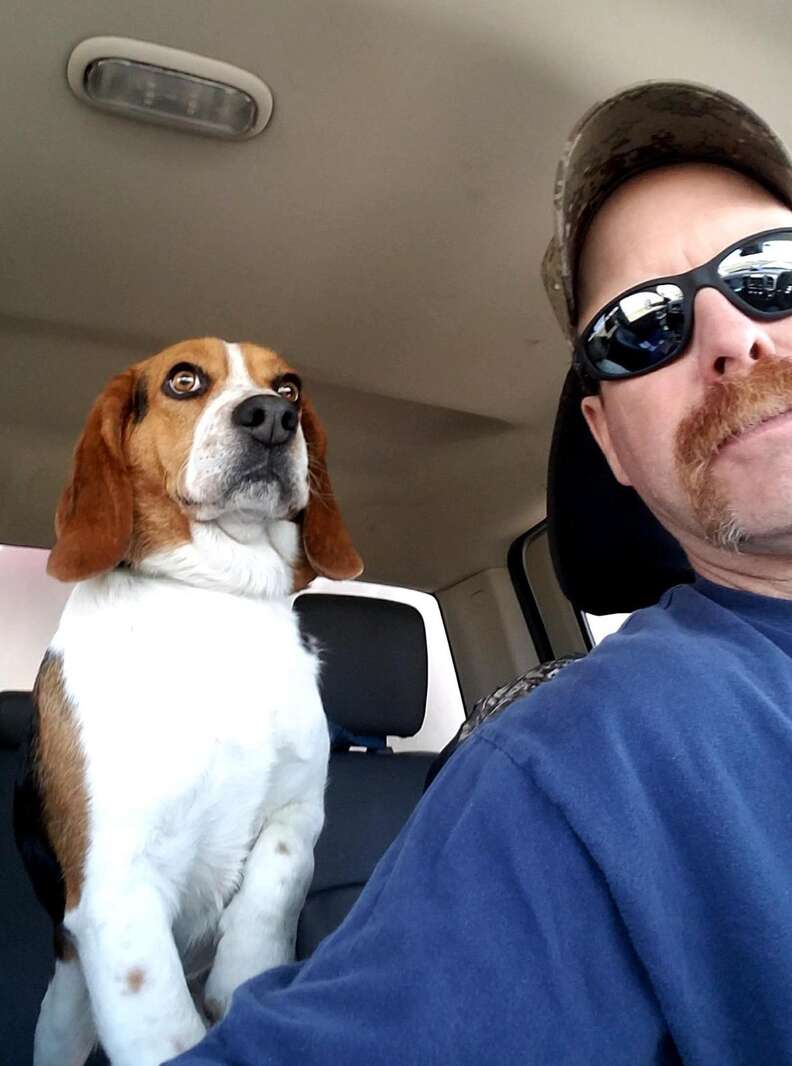 Gregory in the car with rescuer Joe