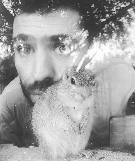 Squirrel with rescuer