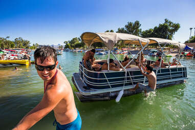 friends enjoying boat party on lake havasu