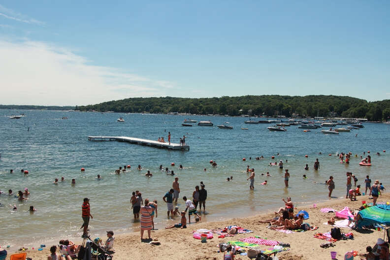 beachgoers enjoying lake geneva