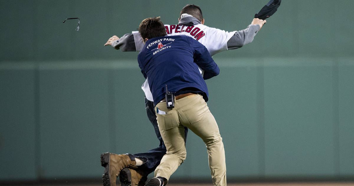 highlight] A lone Angel fan is standing in the middle of a bunch of  shirtless fans in the outfield bleachers at Fenway : r/baseball