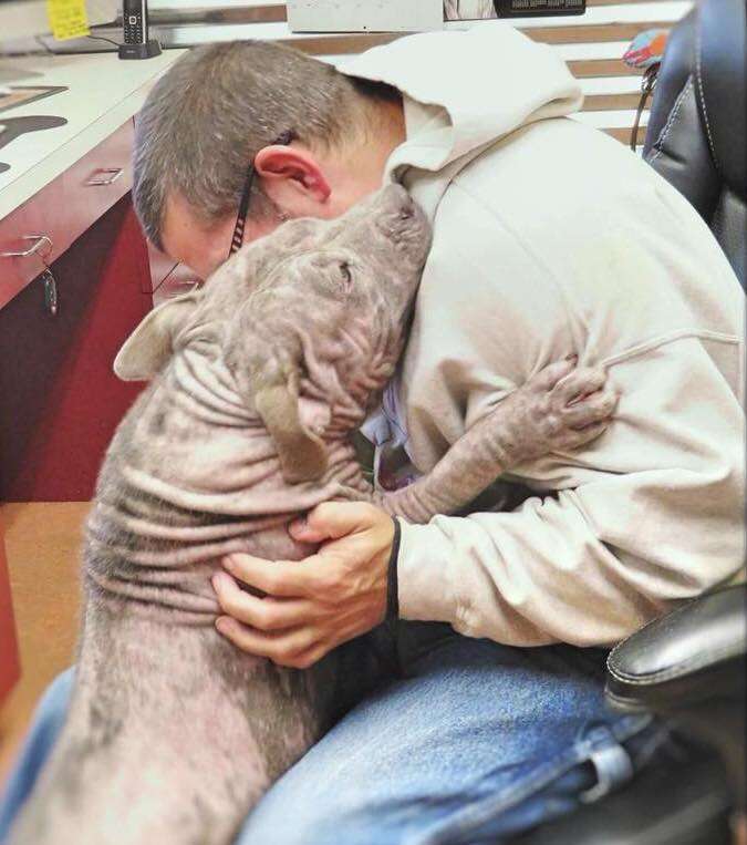 Sylvia hugs a rescue worker