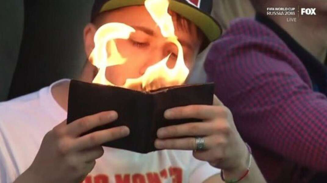 Man at World Cup Lights Cigarette With Flaming Wallet - Thrillist
